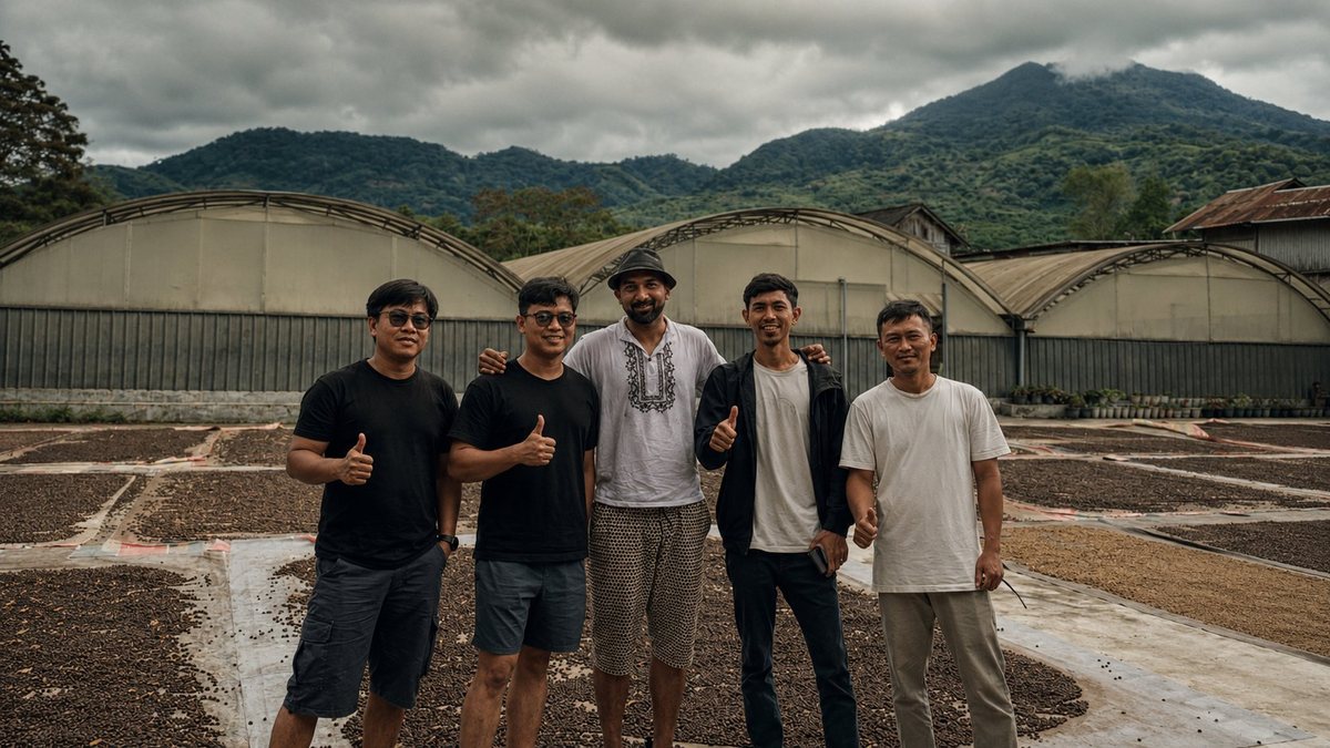 Gayo Wild's founder with the farmers at the drying patio in the Gayo Highlands